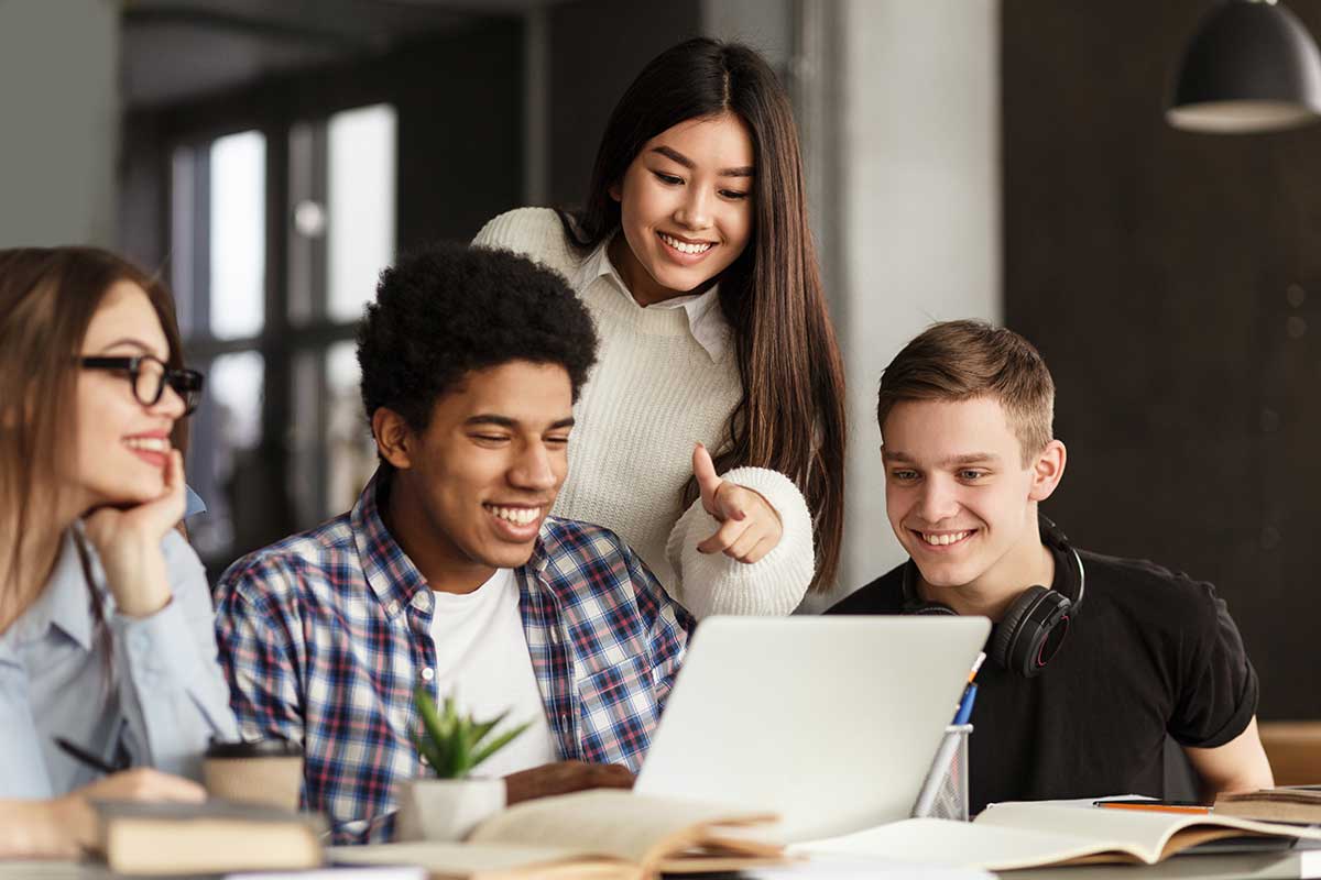 Students around laptop