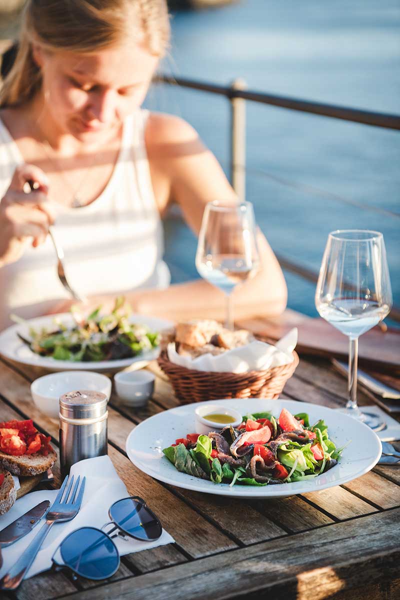 Woman eating salad